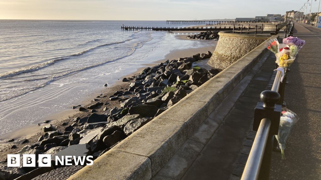 Tributes paid to woman who died on beach rocks - Today news